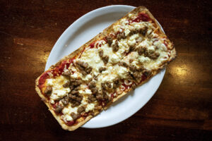 Spicy Sausage & Goat Cheese Flatbread